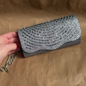 Elegant Silver Clutch with Iridescent Rhinestones and Silver Chain Strap
